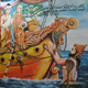 An image of Sanghamitta carrying the Bodhi tree and being received by the king.